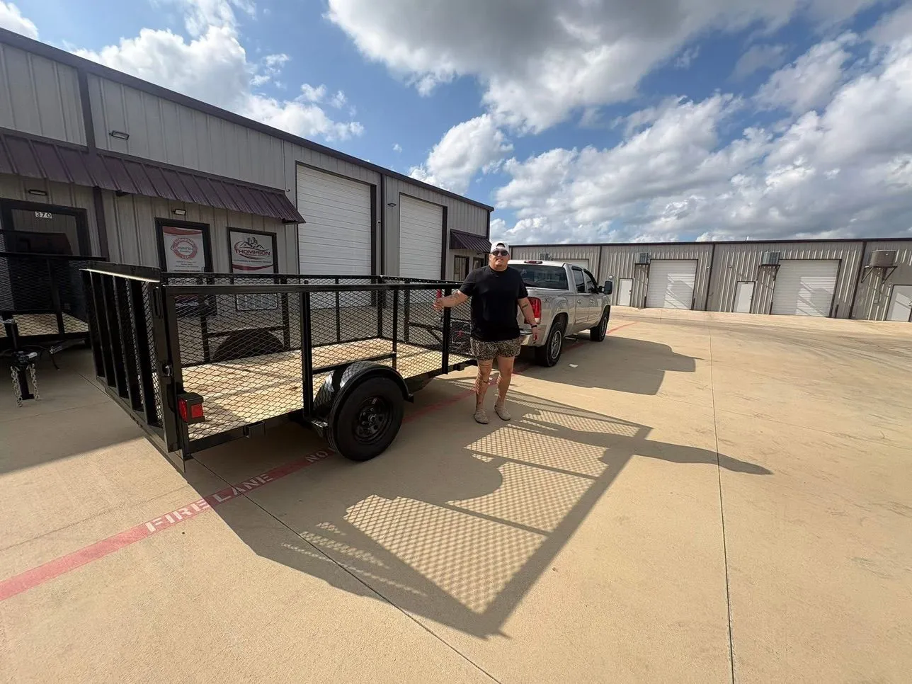 Lock and Load Junk Removal truck and trailer ready to haul